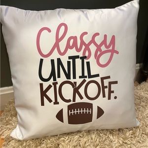 16” white throw pillow. “Football”